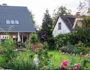 Dachgeschosswohnung Scharbeutz mit Garten
